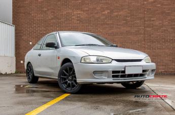MITSUBISHI LANCER CARBINE SATIN BLACK